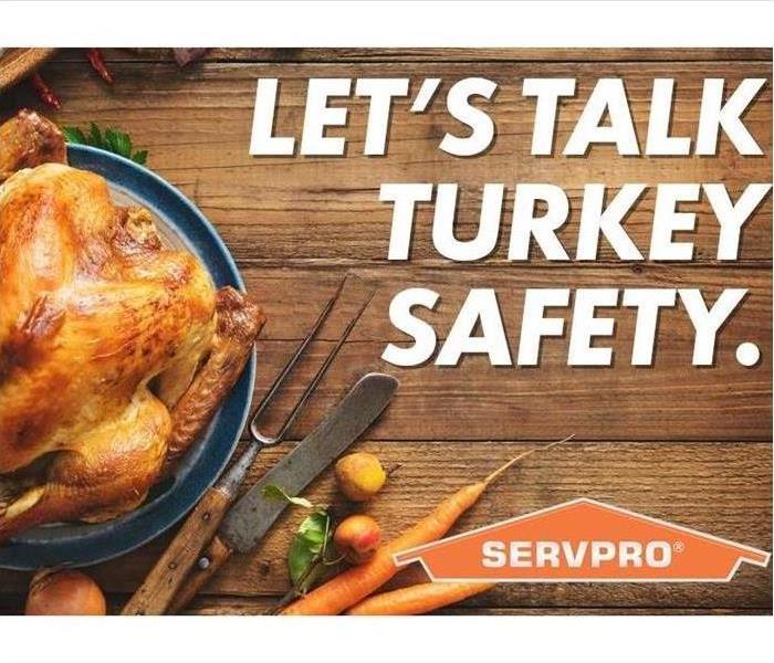 A cooked turkey on a kitchen table, with the caption "Let's Talk About Turkey Safety"