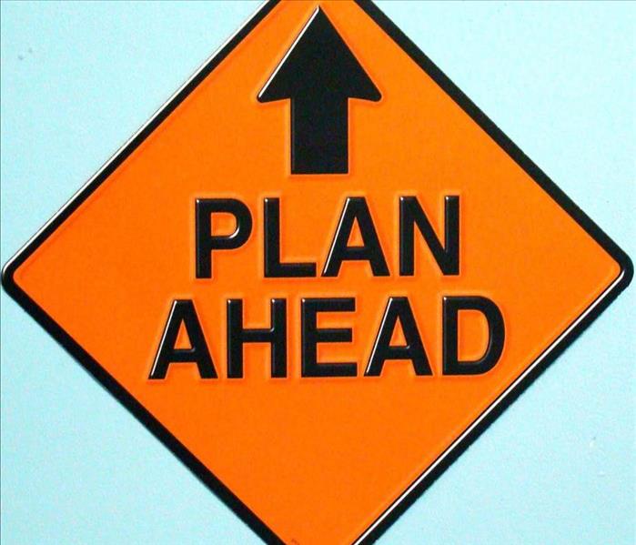 Yellow sign that says "Plan Ahead"